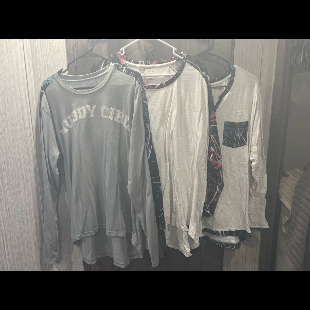 Muddy Girl and Moonshine camo shirts. Women’s xxxl